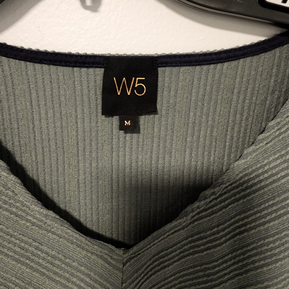 Beautiful green V-neck blouse.